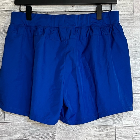 Royal Blue Running Shorts w/Pink Trim. Ladies- size L (has reflective markings) - Picture 9 of 11